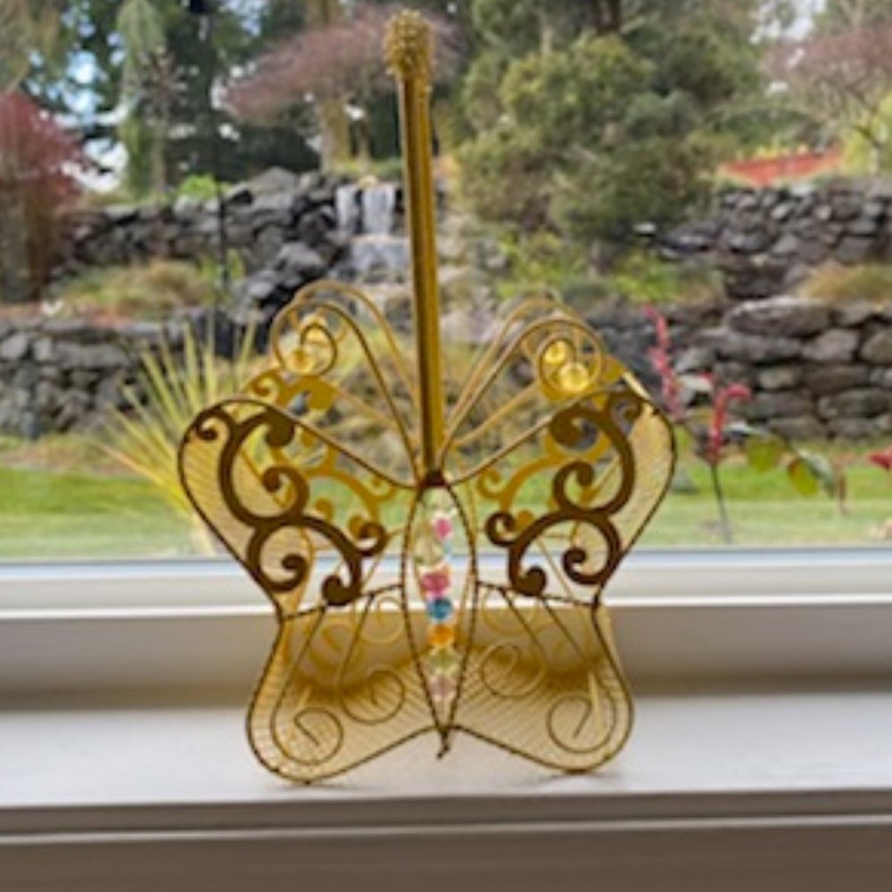 Yellow sparkly butterfly basket